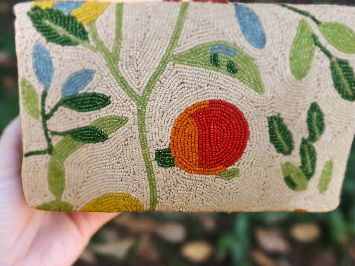 A multicolored clutch bag with a fruit design with beads new zealand