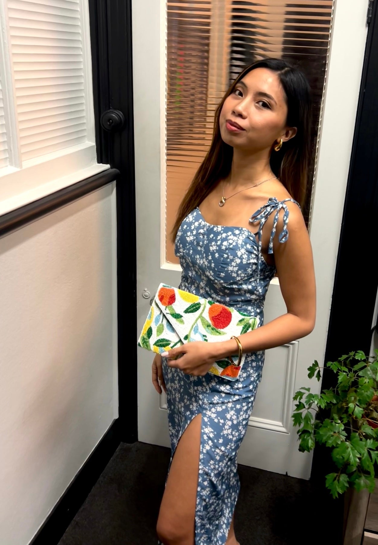A multicolored clutch bag with a fruit design with beads new zealand
